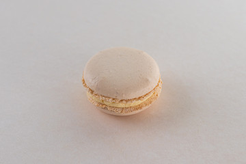 cream macaroon cake on a light background