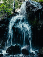 waterfall in the forest. Altai Republic. Russia
