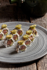 Fototapeta na wymiar Sushi set sashimi rolls served on