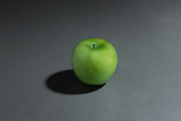 still life ripe fresh green granny apple on a gray background