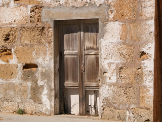 Fototapeta na wymiar closed old wooden doors