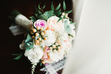 Beautiful wedding bouquet with different flowers, roses