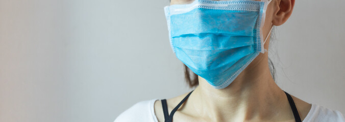 Close up woman wearing a face mask for prevent  dust the spread of germs and bacteria and avoid infections corona virus. Hygiene concept