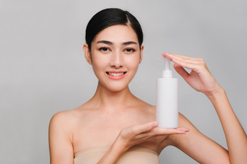 Beauty concept,Young beautiful asian woman with clean and bright skin, Holding a cotton swab to...