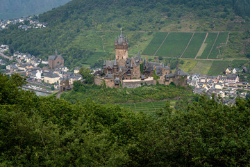 Fototapeta na wymiar Castle Reichsburg sits above the medieval town of Cochem on the Mosel River, Germany.