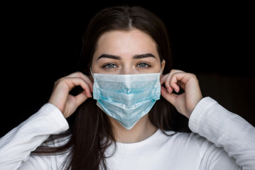 portrait of a girl in a medical mask