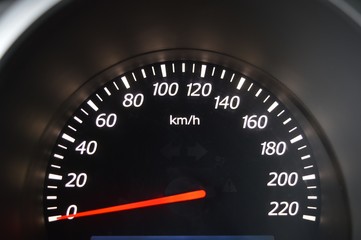 speedometer on black background