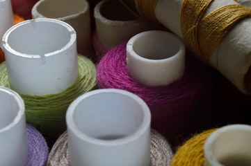 multicolored threads with coils. close up.