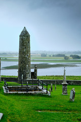 McCarthy's Tower in the medieval monastery of Clonmacnoise, during a rainy summer day.