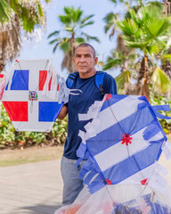 seller of Chichuguas or kite with the Dominican Republic flag in Santo Domingo