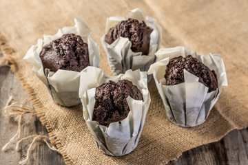 homemade cupcakes on wooden table
