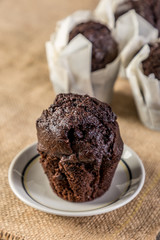 homemade cupcakes on wooden table