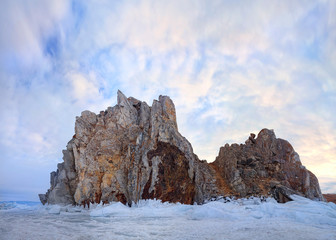 Fototapeta na wymiar Winter landscape with a rock