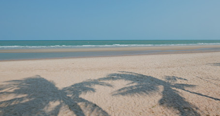 Clear blue sky and sand beach