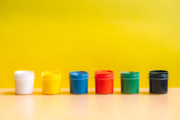 Set of Colorful Gouache on yellow background