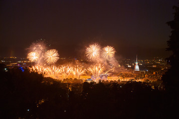 Panoramic view of Turin with fireworks at the feast of San Giovanni