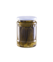 Canned, pickled gherkins in a 700 ml glass jar isolated on a white background.