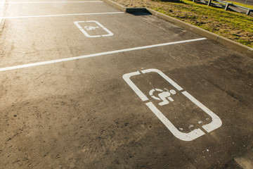 Handicapped sign and parking markings