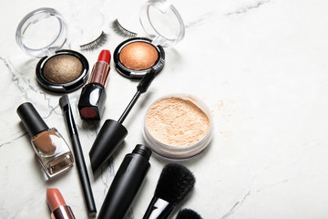 Set of decorative cosmetics on a light background.