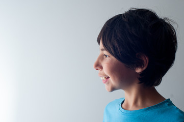 smiling young boy profile.