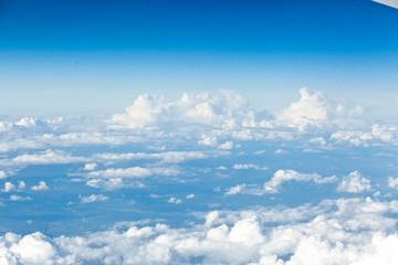 Clouds top view of the airplane. Heavenly landscape.