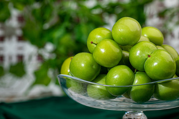 organic and green plum collected from nature