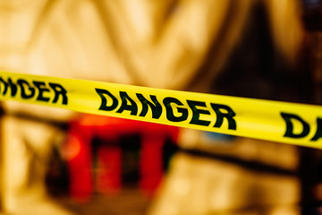 The playground during quarantine is sealed with warning signs, a tape with the word Danger. Coronavirus, Covid-19