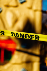 The playground during quarantine is sealed with warning signs, a tape with the word Danger. Coronavirus, Covid-19