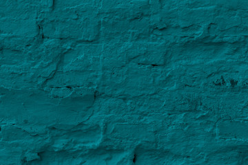 Green plastered brick wall texture.