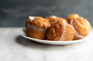 Banana Streusel muffins on a white plate