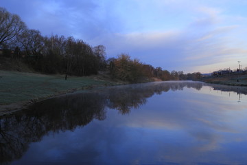Fototapeta premium Sunrise over the river in spring time