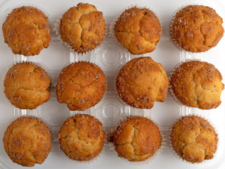Banana Streusel muffins in a plastic tray