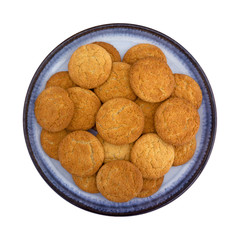 Group of coconut flavor cookies on a blue plate