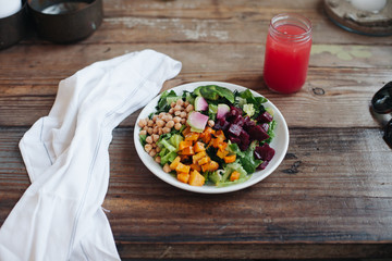 Organic salad in rustic cafe in Malibu