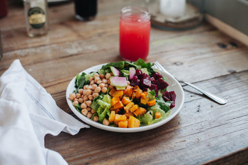 Organic salad in rustic cafe in Malibu
