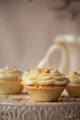 freshly baked and fluffy butter cream cupcakes with lemon juice taste