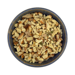 Bowl of stovetop stuffing on a white background