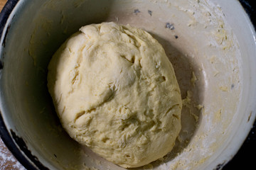 Knead the dough in an old bowl