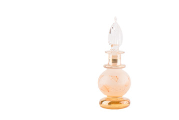 Elegant glass bottle for perfume isolated on a white background.