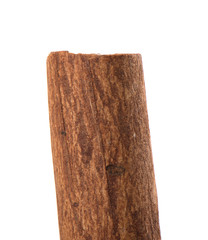 Fototapeta premium Macro shot of cinnamon sticks isolated on a white background.