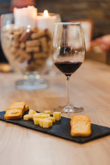 Fototapeta premium Close up on wine glasses in vineyard shop at tasting experience