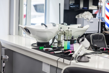 white washbasin at barber shop interrior
