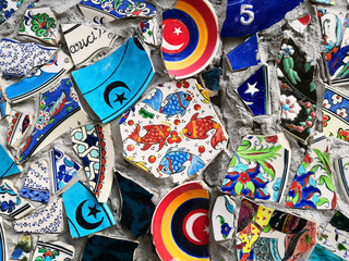 colorful broken ceramic shards closeup