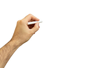 Left hand with a chalk isolated against whiteboard, copy space