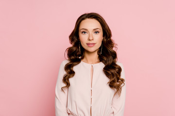 pretty young woman standing isolated on pink