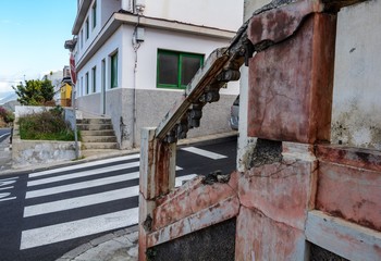 transition from bad to good. old house opposite a nice house