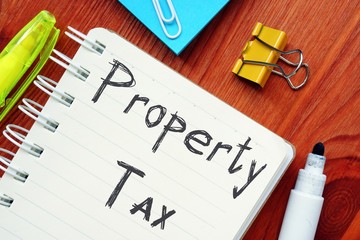 Business concept meaning Property Tax Definition with inscription on the sheet.