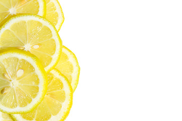 Cropped shot of yellow sliced ​​lemon isolated on white background. Citrus background. Colorful food backdrop.