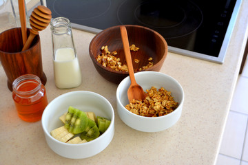 Cooking delicious and healthy breakfast. Cooking granola. Healthy food concept