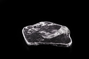 Rhodium nugget, chemical element with Rh symbol, metal for industrial use, used in jewelry and automatic equipment.